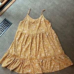 Mustard colored dress with white leaf print dress